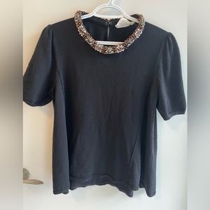 Light short sleeved knit top with beaded neckline from Anthropologie.